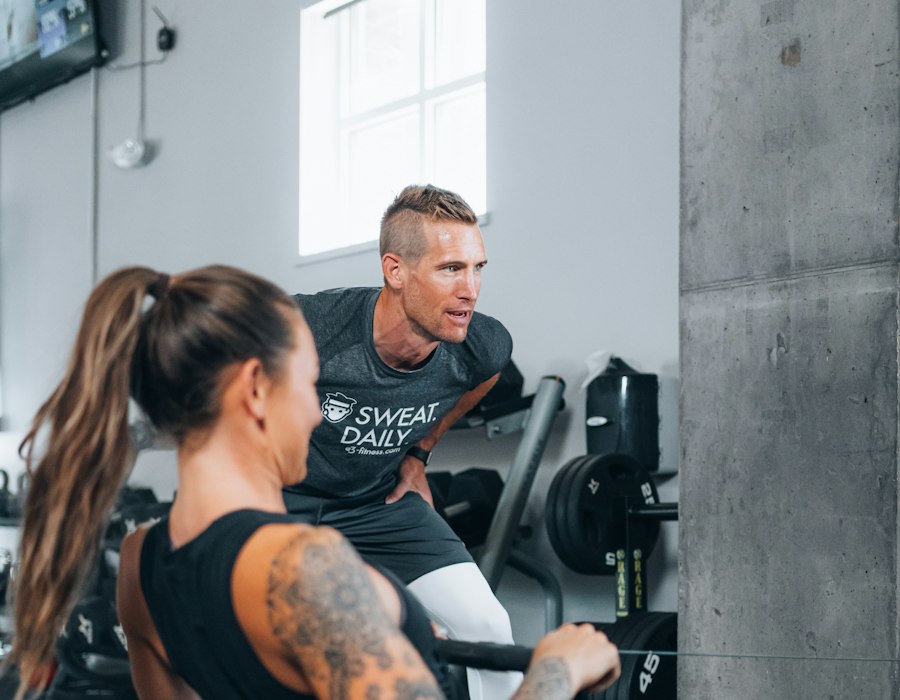 Personal trainer delivering a premium client experience