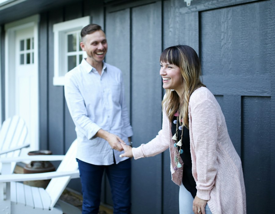 Real estate agent welcoming clients