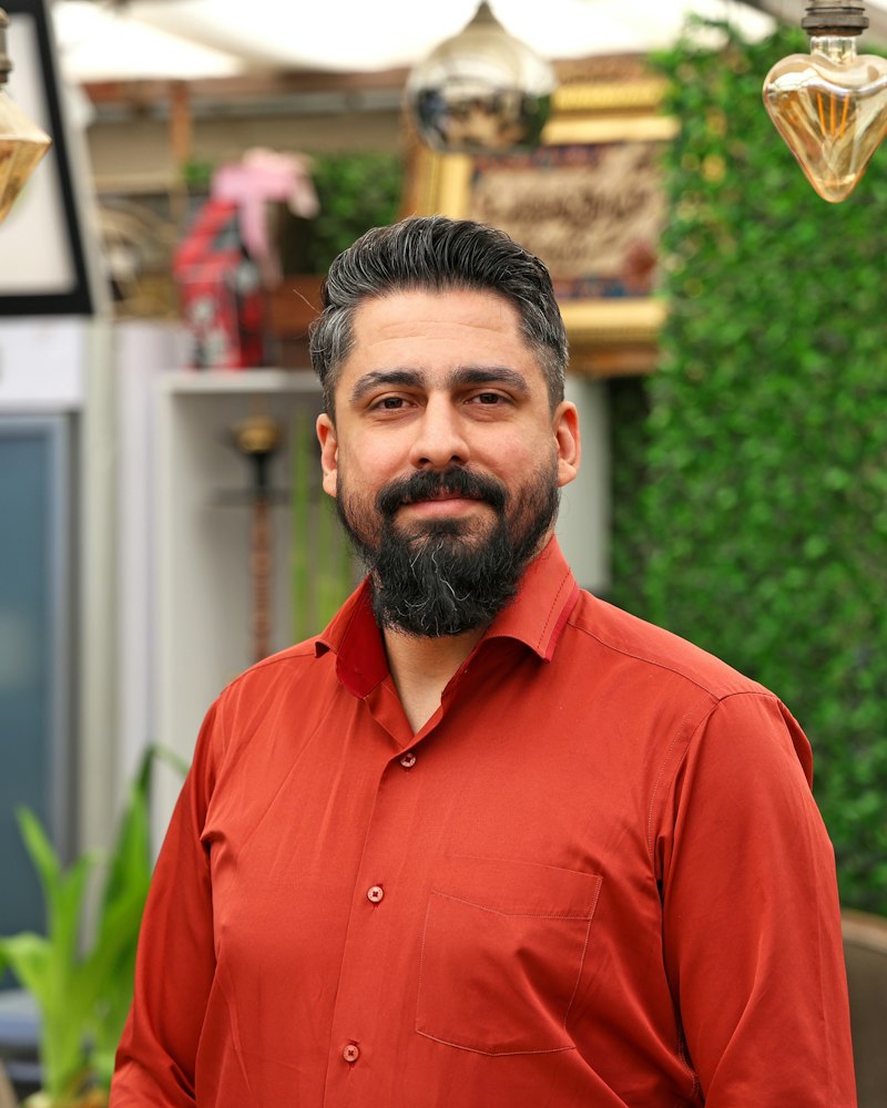 Restaurant owner welcoming guests